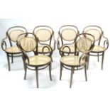 A set of six Bentwood elbow café chairs, inset woven cane panels to the seats & backs, & on round
