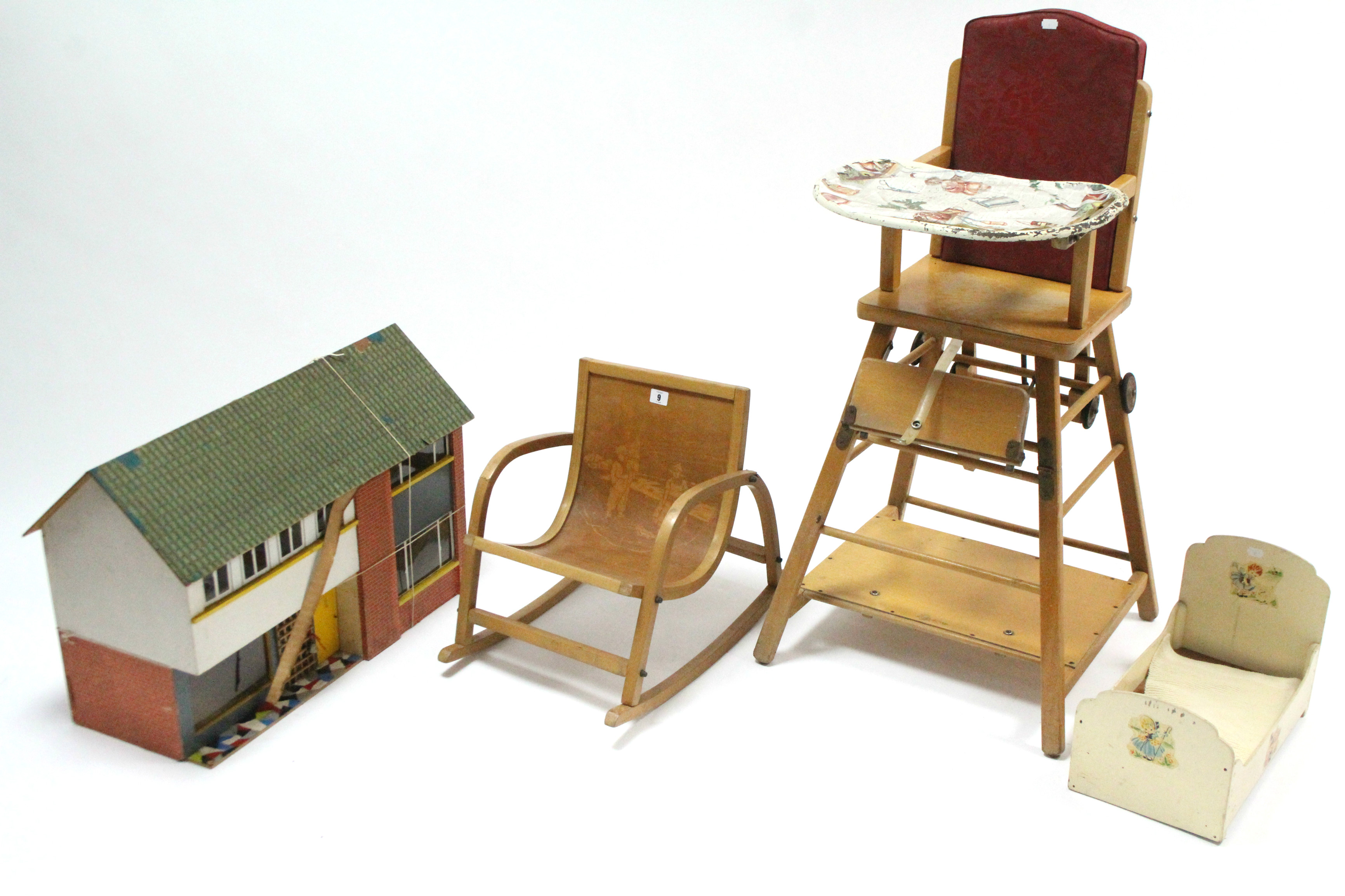 A Bentwood child's rocking chair; a baby's high/low chair; a doll's house; & a doll's cradle.