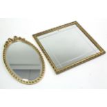 A gilt frame square wall mirror inset bevelled plate, 23” wide; & a gilt frame oval wall mirror, 24”