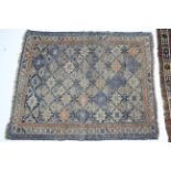 Two Persian pattern rugs (both worn); & a wicker hamper (lacking contents).