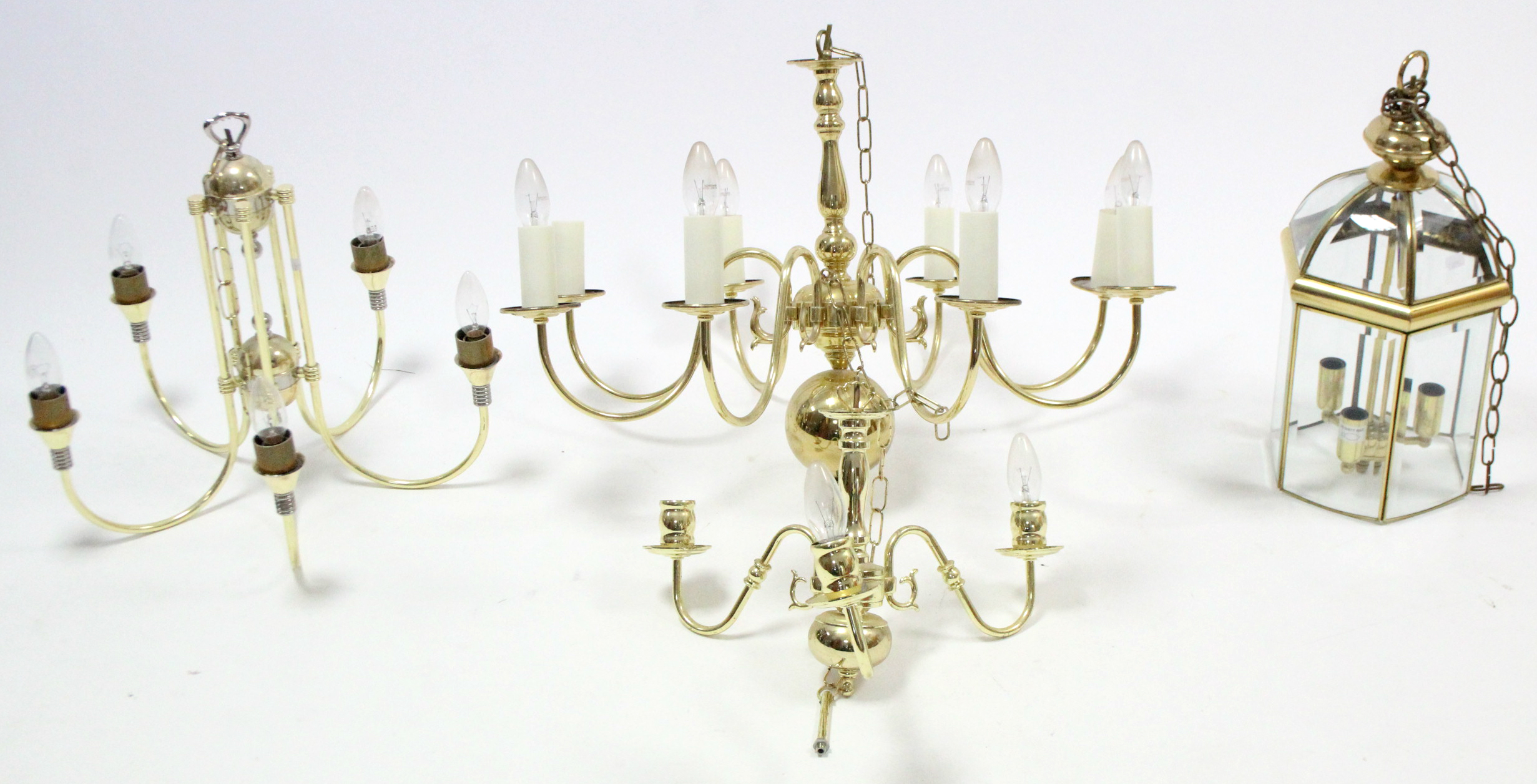 Four modern brass ceiling light fittings; & four table lamp bases each with shade.