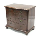 A Georgian-style mahogany serpentine-front chest, fitted four long graduated drawers with brass wing
