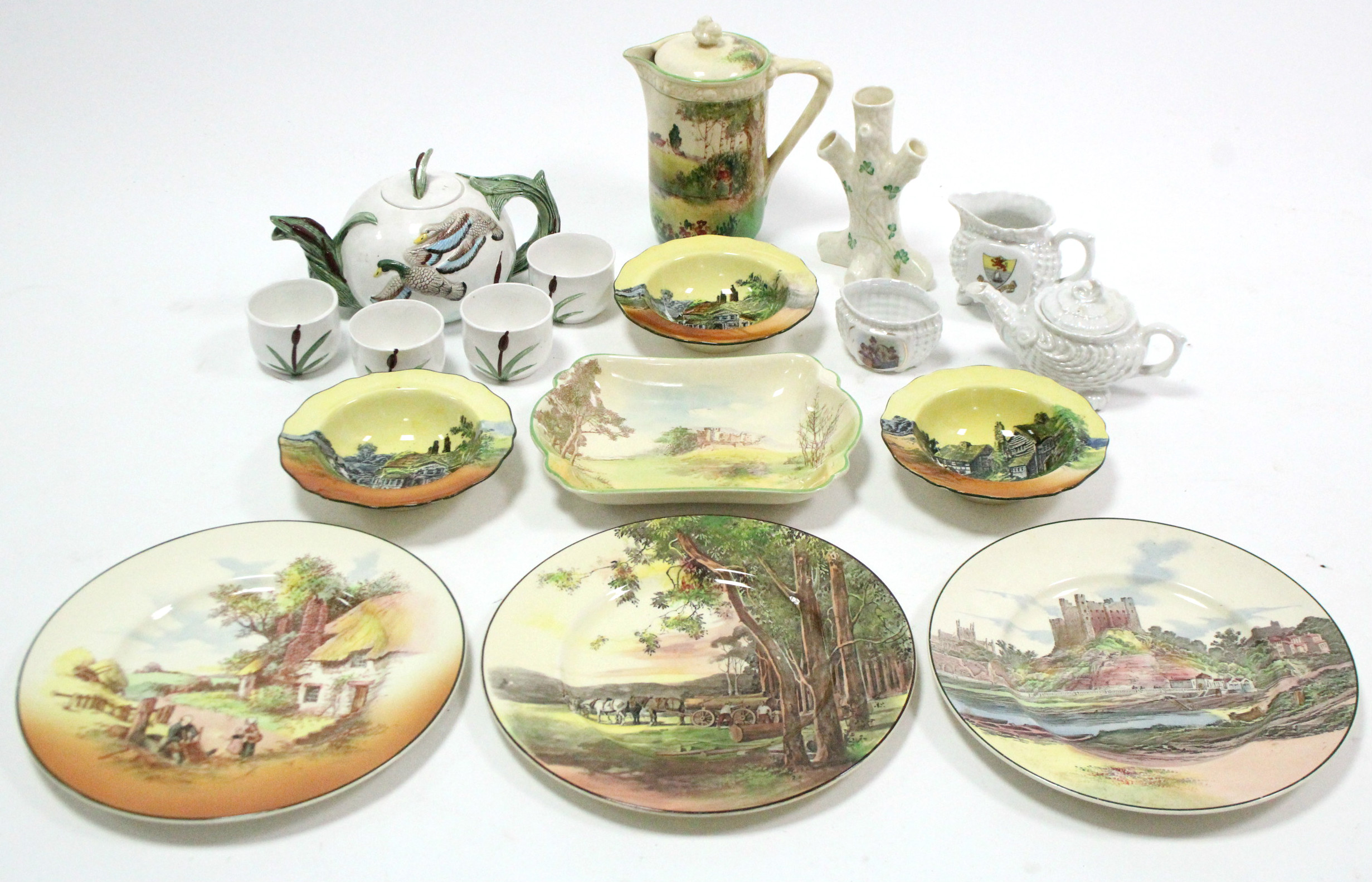 Eight items of Royal Doulton series ware; a Belleek child’s three piece tea service; a ditto spill