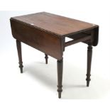 A 19th century mahogany Pembroke table (lacking drawer), & on turned tapered legs, 35½” wide.