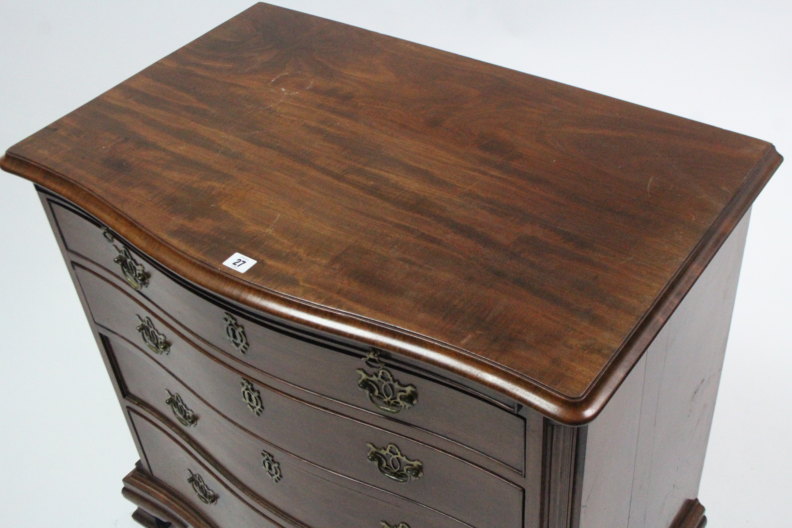 A Georgian-style mahogany serpentine-front chest, fitted four long graduated drawers with brass wing - Image 6 of 6