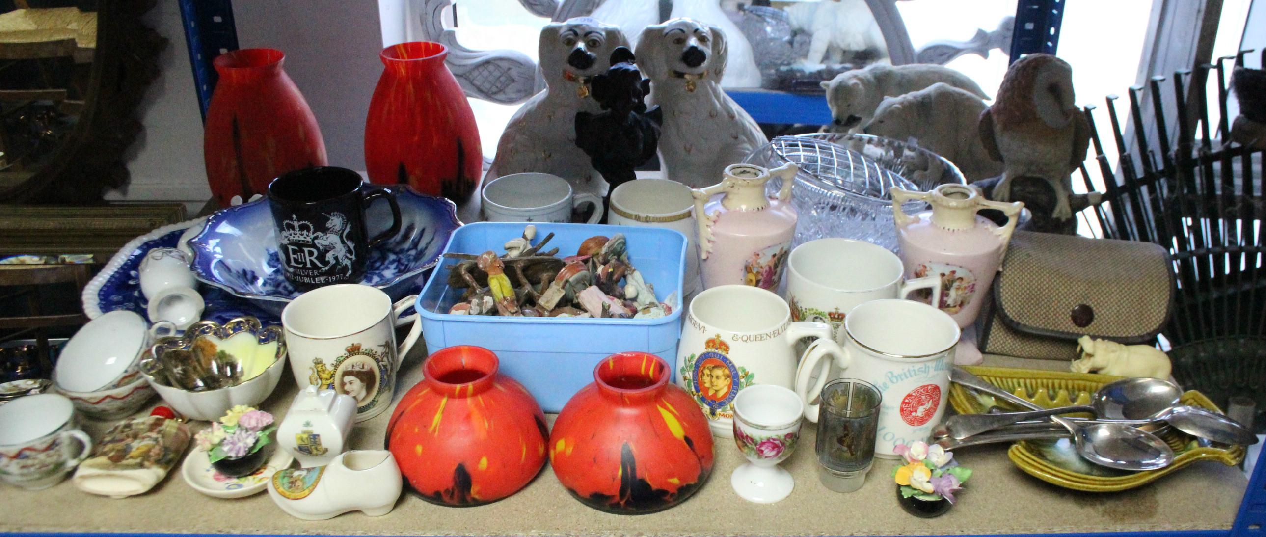 A pair of pottery flat-back spaniel ornaments; two pairs of art-glass vases; a cut-glass fruit bowl,