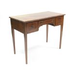 A 19th century mahogany crossbanded kneehole dressing table fitted three frieze drawers, & on square