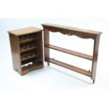 A pine standing wine-rack, 20” wide x 29½” high; & a pine wall shelf, 42” wide x 33” high.