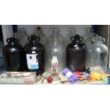 Eighteen glass demijohns; various Royal commemorative mugs, etc.