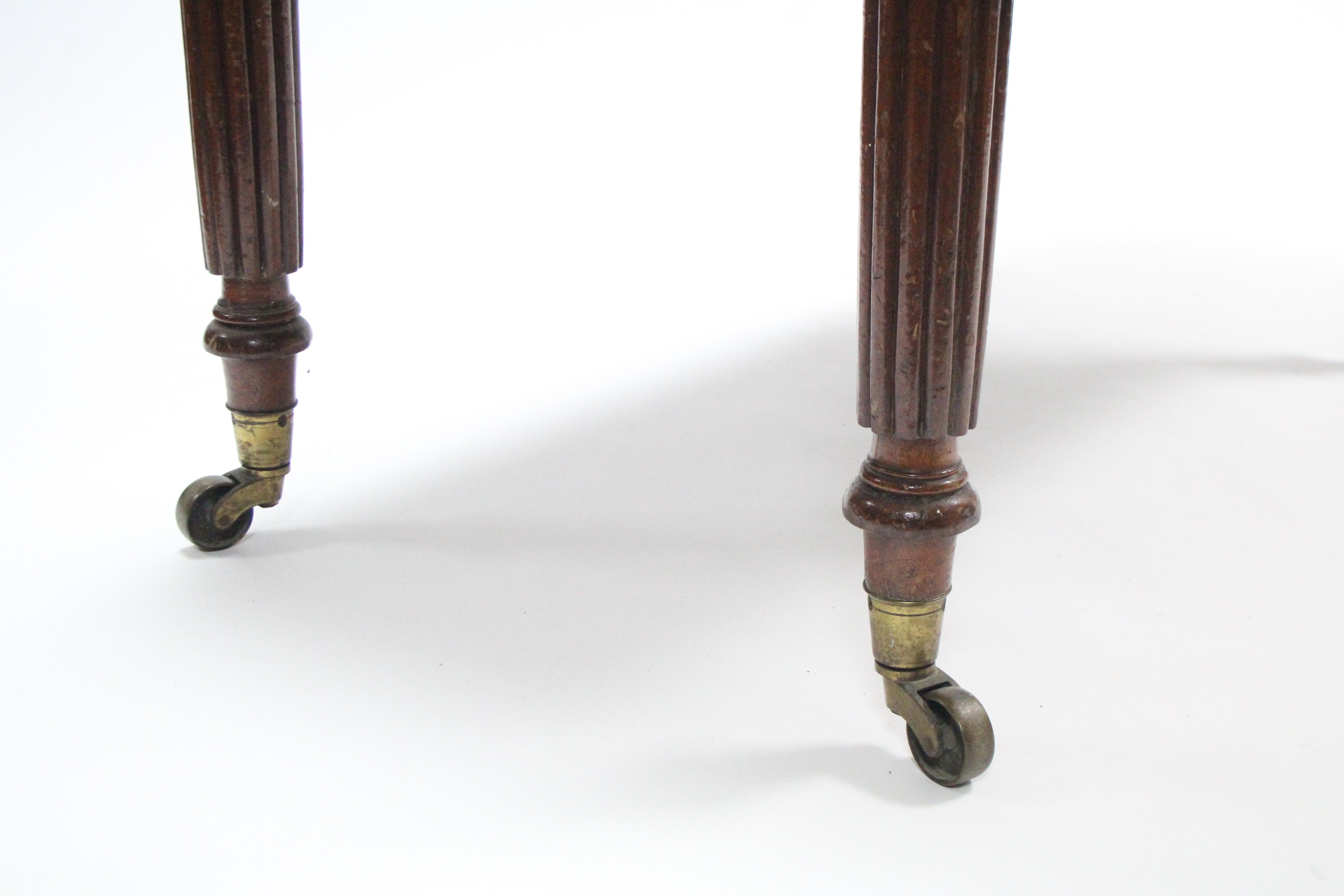 A 19th century mahogany Pembroke table fitted end drawer, & on fluted & turned tapered legs with - Image 2 of 2