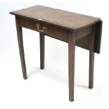 A 19th century oak drop-leaf side table fitted long frieze drawer, & on square tapered legs, 29¾”