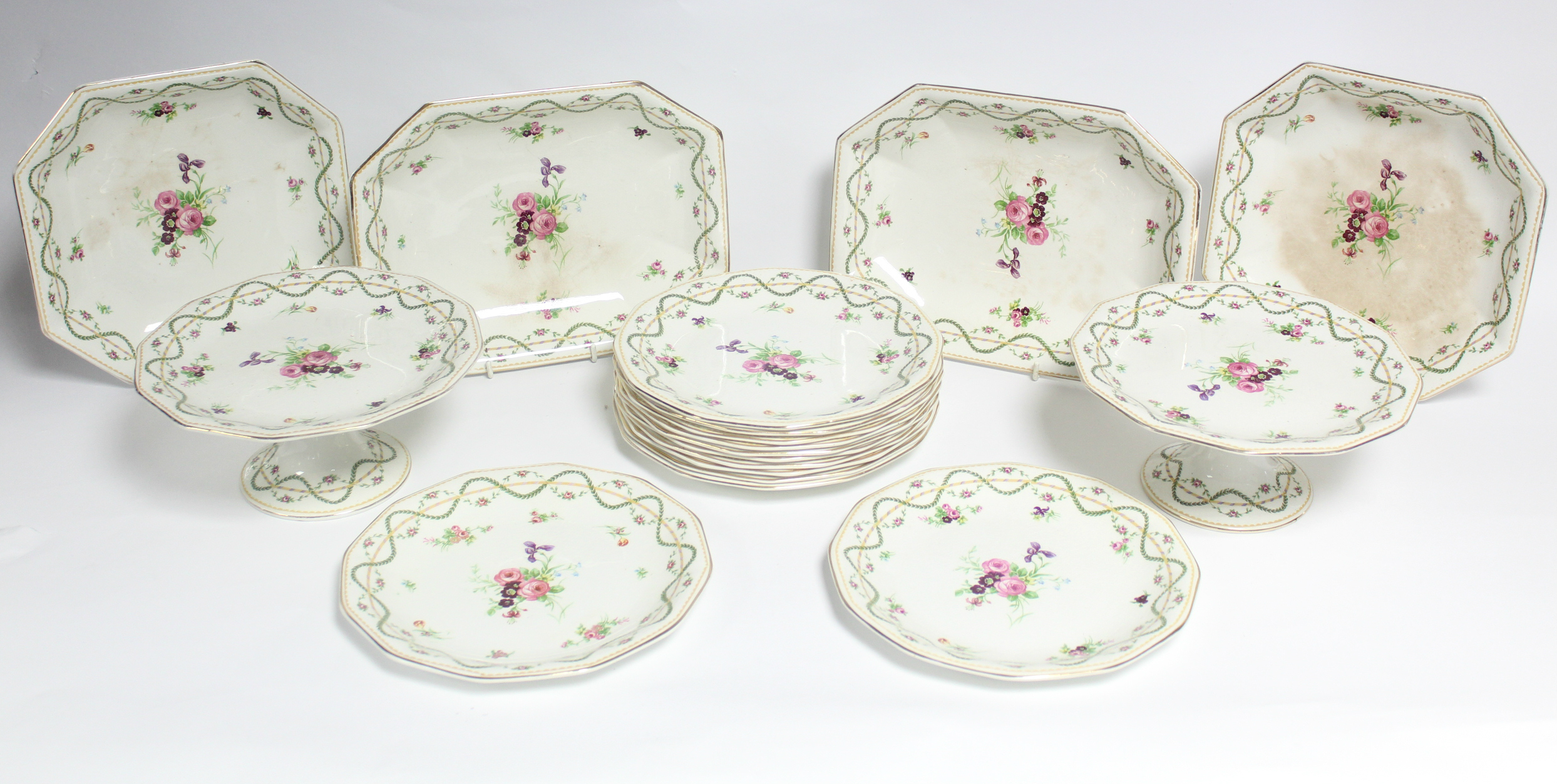 A Wedgwood & Co. “Imperial Porcelain” dessert service with floral decoration, comprising a pair of