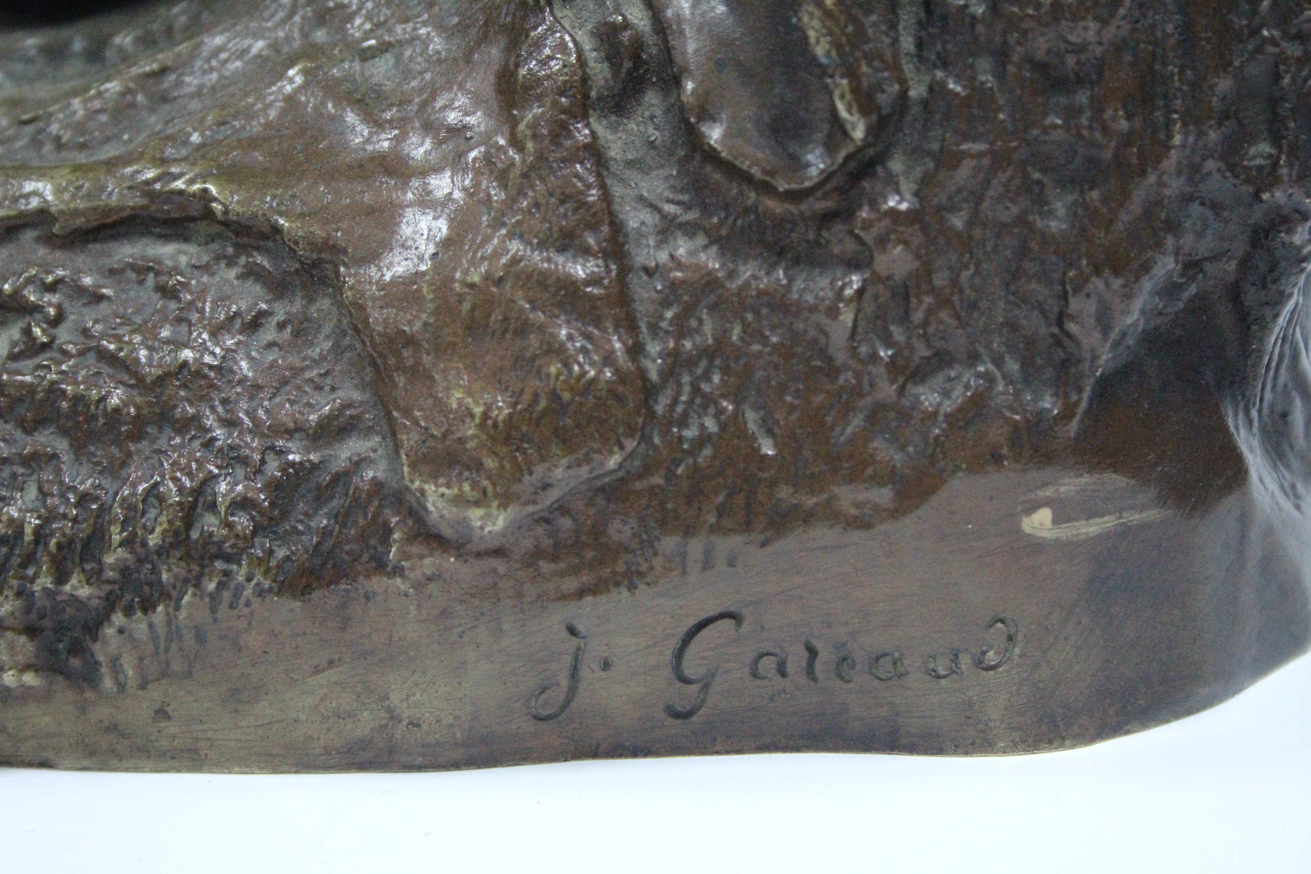 GAREAUD, J. A bronze group of a nude female figure reclining on an animal skin, a goat & kid - Image 2 of 4
