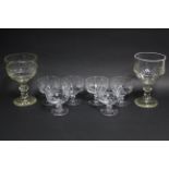 A pair of 19th century cut glass large round goblets, each on knop stem & round star-cut base, one