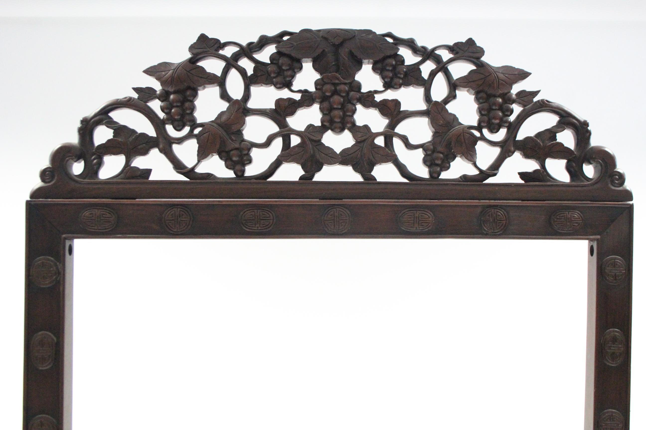 A Chinese carved hardwood rectangular screen (lacking central panel) with pierced grapevine - Image 3 of 4