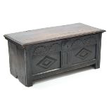 A late 17th century oak small coffer with original hinges to the lift-lid, carved decoration to