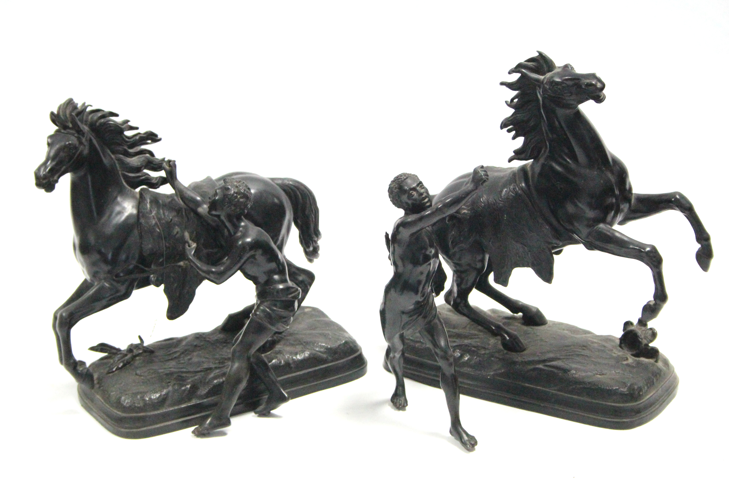 A pair of bronzed speltre Marley horses; 13” high (the figures detached).