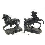 A pair of bronzed speltre Marley horses; 13” high (the figures detached).