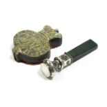 A late 19th/early 20th century white metal desk seal decorated with green enamel & red simulated