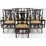 A matched set of eight Chippendale-style dining chairs comprising four elbow chairs & four single