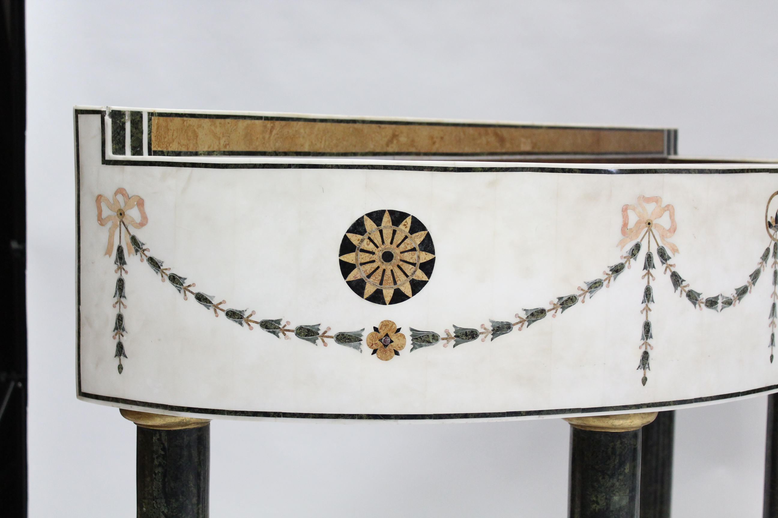 A PAIR OF WHITE MARBLE & PIETRA DURA JARDINIÈRE TABLES, each of demi-lune shape, decorated with husk - Image 4 of 8