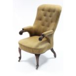 A William IV mahogany-frame armchair with tall buttoned-back & open scroll arms, upholstered old