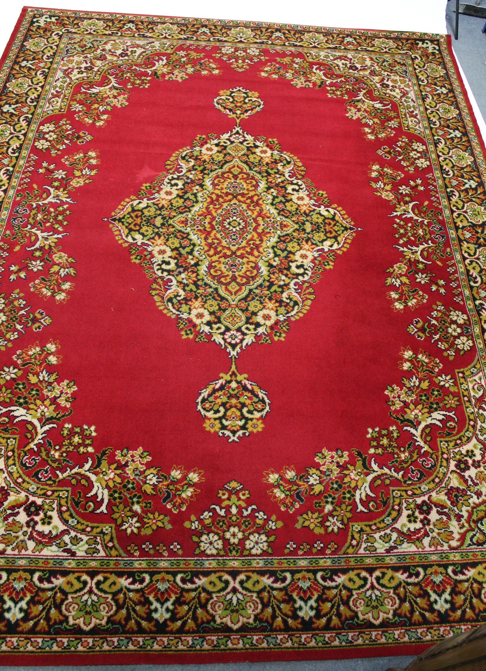 An Axminster-type Persian pattern carpet of crimson ground central medallion surrounded by floral - Image 2 of 5