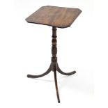 An early 19th century oak & elm tripod table, the rectangular tilt-top with canted corners & ebony