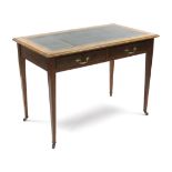 A late 19th/early 20th century oak writing table inset gilt tooled dark green leather top, fitted