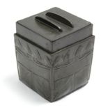 A Liberty ‘Tudric’ pewter square box with flat cover, the sides with stylised foliate decoration