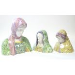 An Italian polychrome faience bust of the Madonna by Angelo Minghetti, 8” high; & two smaller busts,