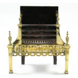 An Adam style cast-iron & brass fire grate, 24" wide x 26" high; together with various fire