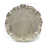 A George V circular salver with raised pie-crust edge, the centre engraved with facsimile