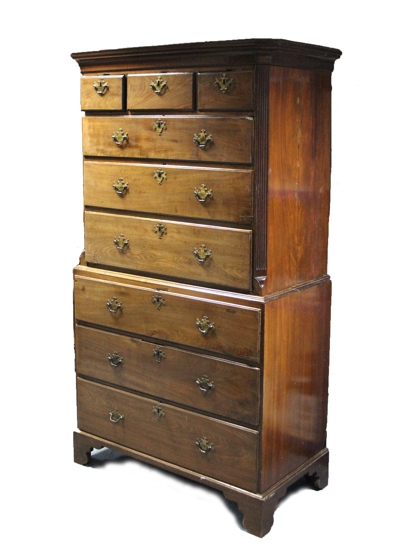 An 18th century mahogany chest-on-chest, the upper part with cavetto cornice & fluted canted