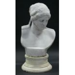 A sculptured white marble classical female bust, on separate white marble circular base; 26” high