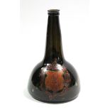 An 18th century wine bottle with hemispherical body & long tapered neck, cold-painted with an