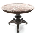 AN EARLY VICTORIAN CARVED MAHOGANY CENTRE TABLE, the circular rouge-marble top with moulded edge, on