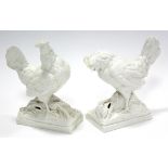 A pair of Royal Worcester white-glazed porcelain models of chickens by A. Azori, titled: “