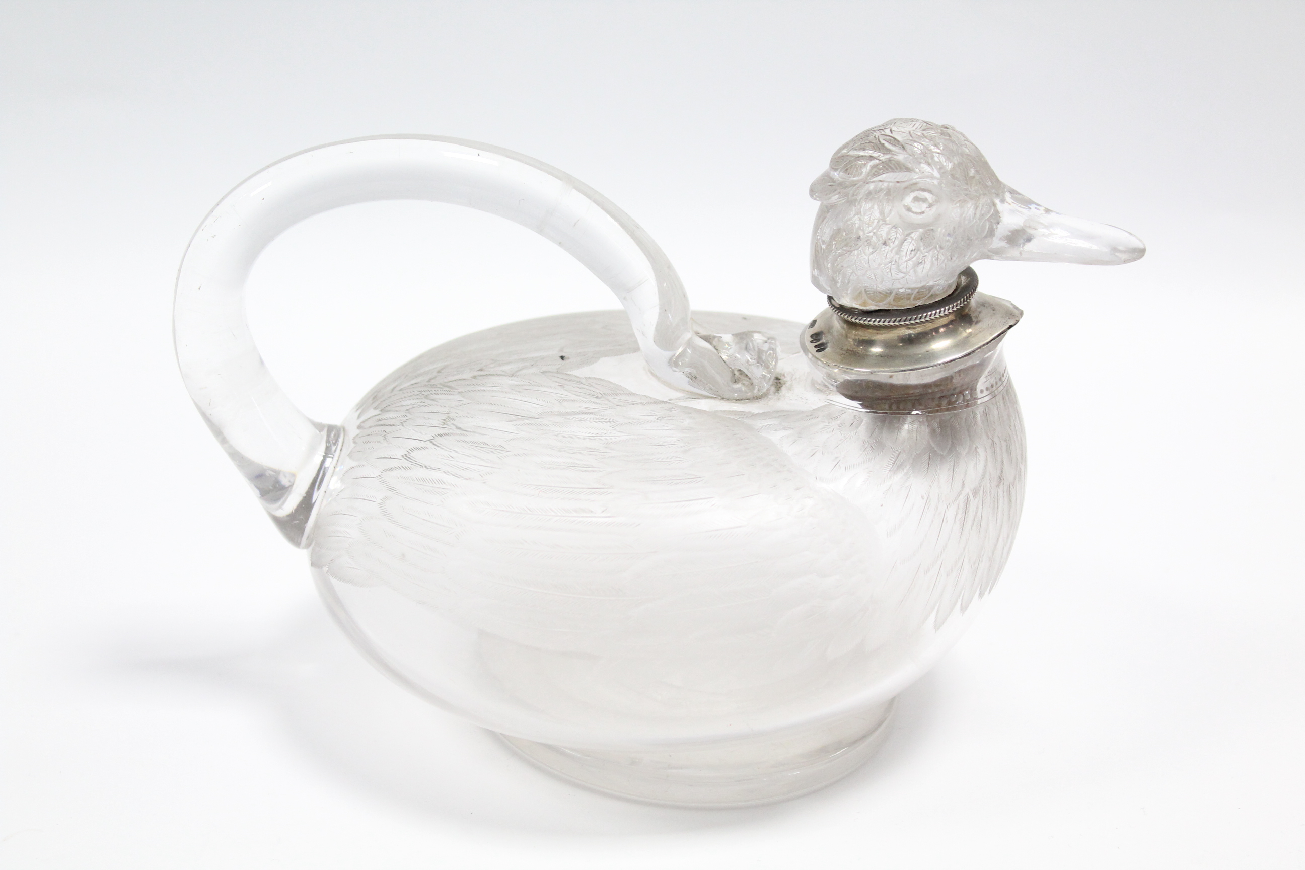 A Victorian silver-mounted cut glass novelty decanter in the form of a duck, the body with