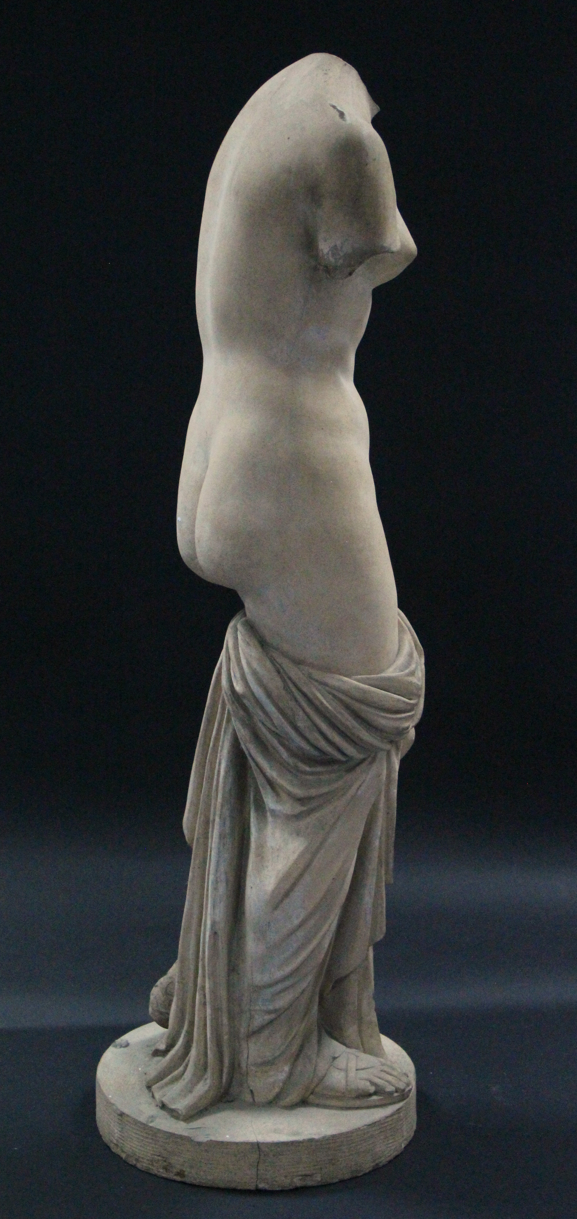 A reconstituted stone classical female nude figure, on flat circular base; 34¾” high. - Image 4 of 4