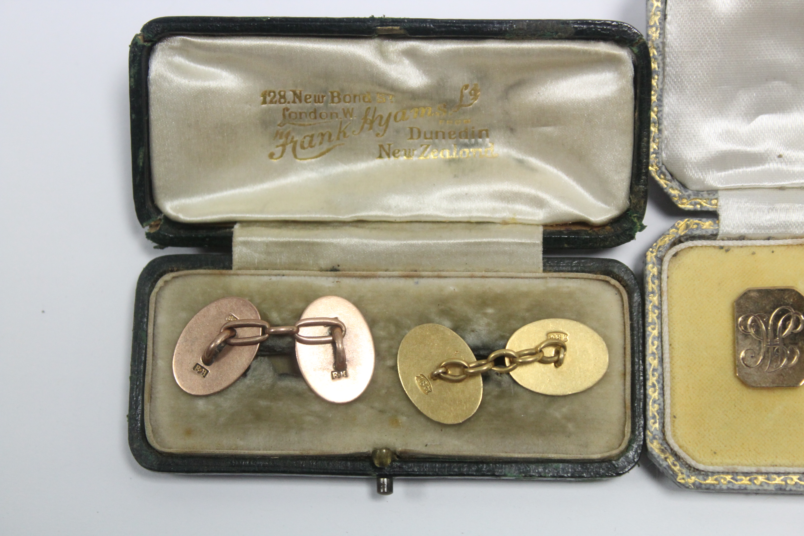 A pair of 9ct. gold cuff-links, the oblong panels with canted corners, London 1939 (12gm); a - Image 3 of 4