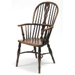 A MID-19th century YEW & ELM WINDSOR ELBOW CHAIR with shaped & pierced splat to the hooped spindle