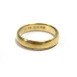 A 22ct. gold wedding band; Birmingham 1926. (8.3g).