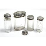 An Edwardian circular pill box with embossed hinged lid, Birmingham 1902; & four cut glass