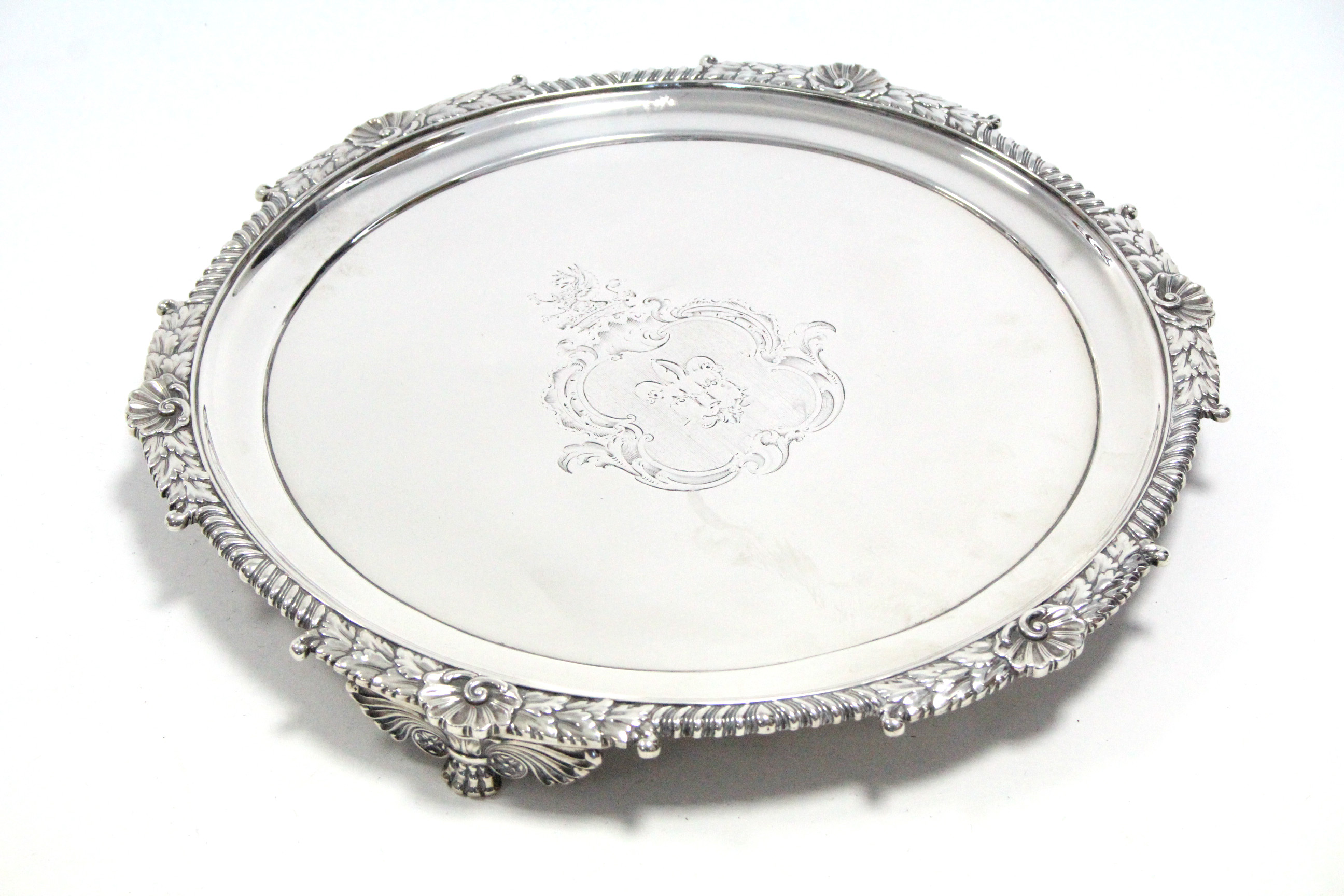 A GEORGE III CIRCULAR SALVER with gadrooned shell & leaf-scroll border, engraved armorial to the - Bild 4 aus 5