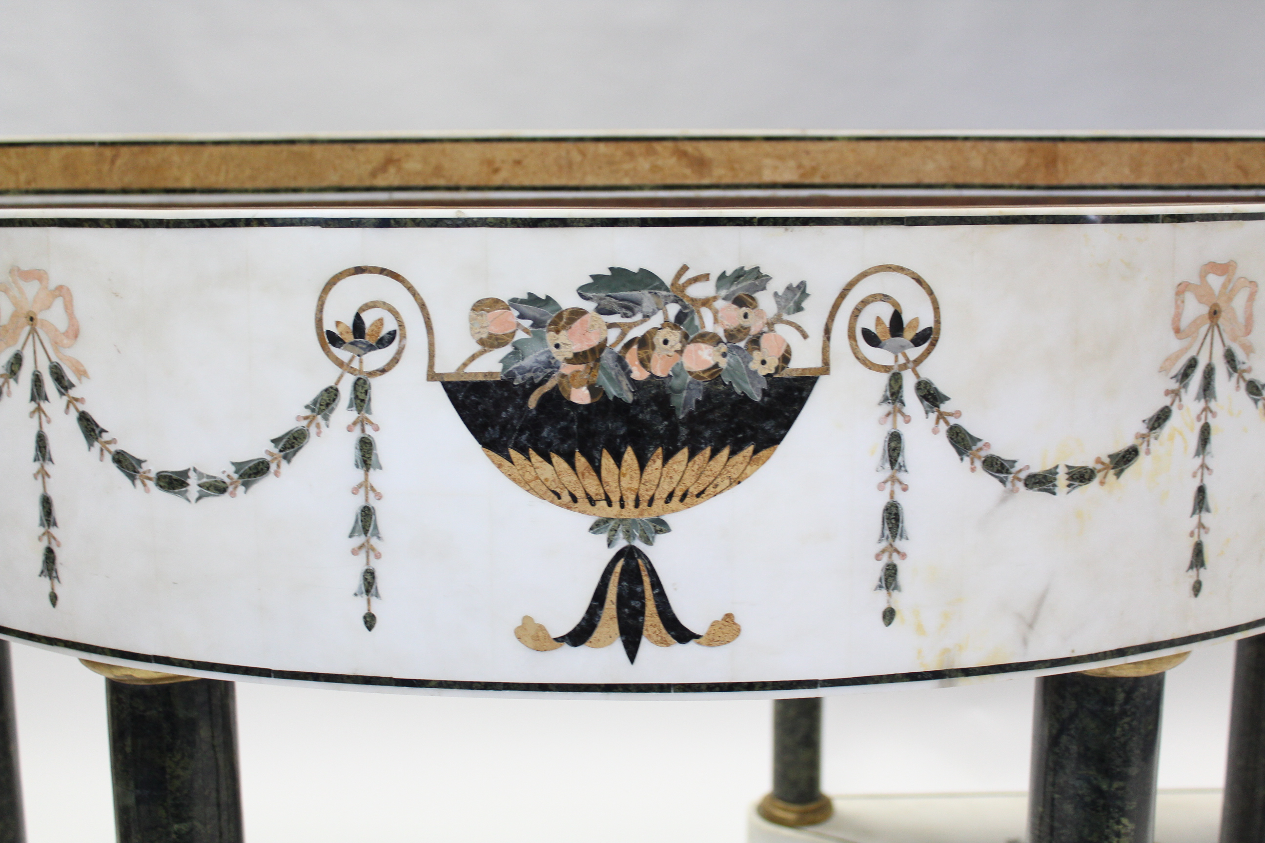 A PAIR OF WHITE MARBLE & PIETRA DURA JARDINIÈRE TABLES, each of demi-lune shape, decorated with husk - Image 3 of 8