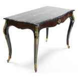 A 19th century EBONISED, AMBOYNA & ORMOLU MOUNTED SIDE TABLE of serpentine outline, the portor