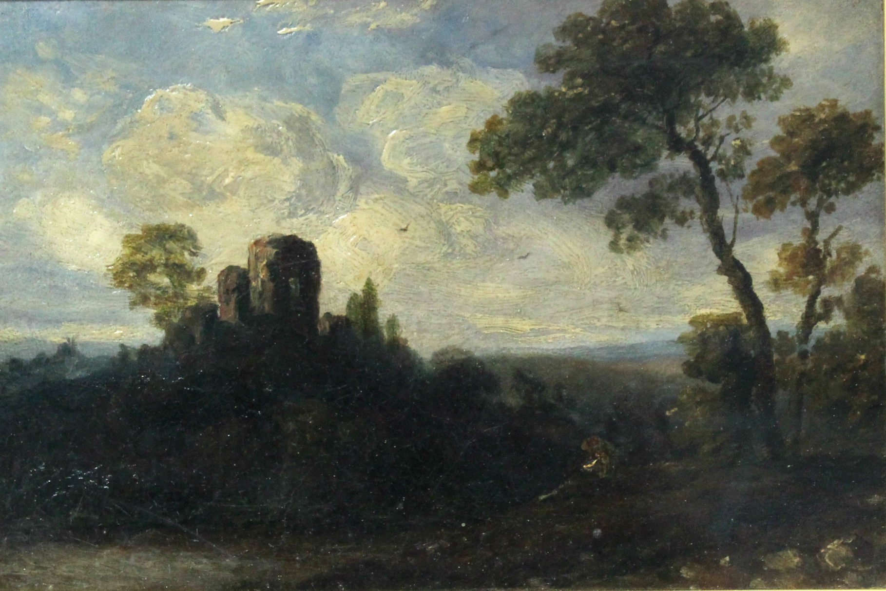 Follower of JOHN CONSTABLE (1776-1837). A wooded landscape with view of Hadleigh Castle, Essex.