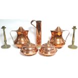 A pair of large copper jugs with hinged lids, the handles die-stamped: “Battaglia, Ramiere”, 10”