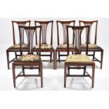 A set of six 19th century mahogany dining chairs with pierced splat backs, padded drop-in seats
